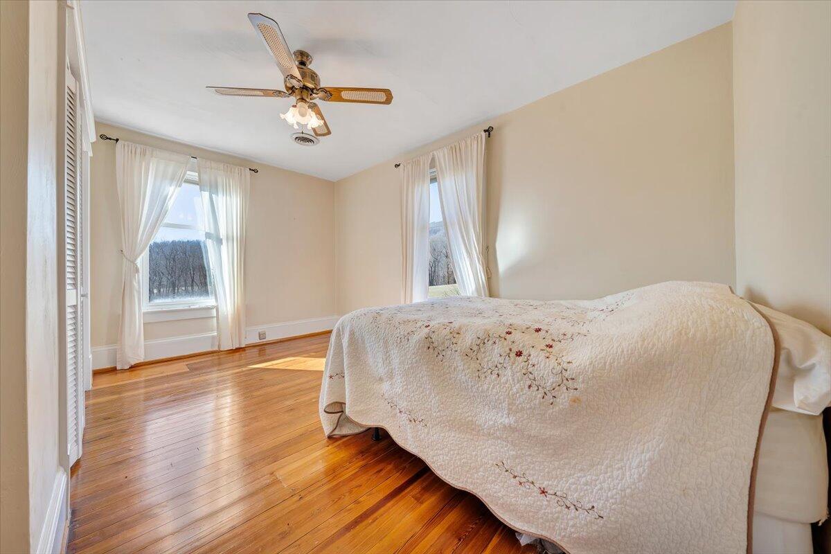 181 Chestnut Grove Road Callaway, VA 24067 - Photo 40 of 51 a bedroom with a bed and window