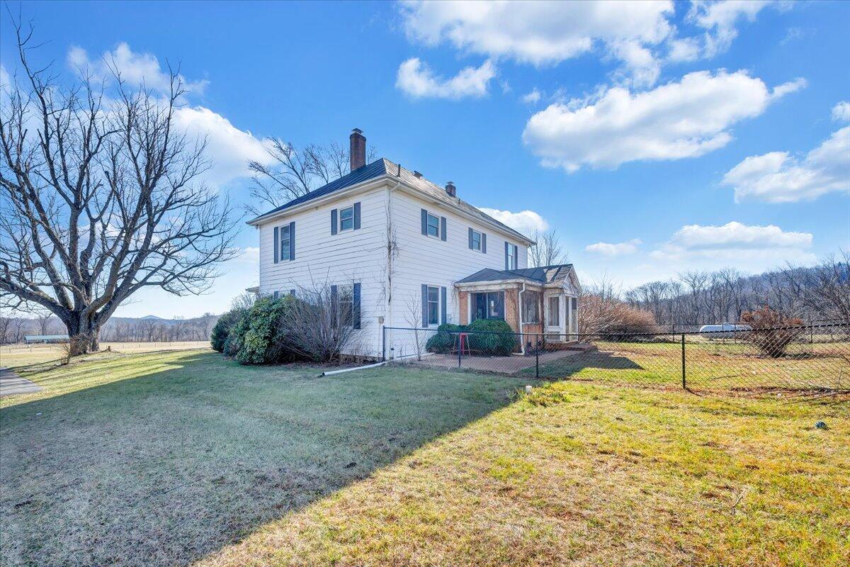 181 Chestnut Grove Road Callaway, VA 24067 - Photo 5 of 51 a view of a house with a yard