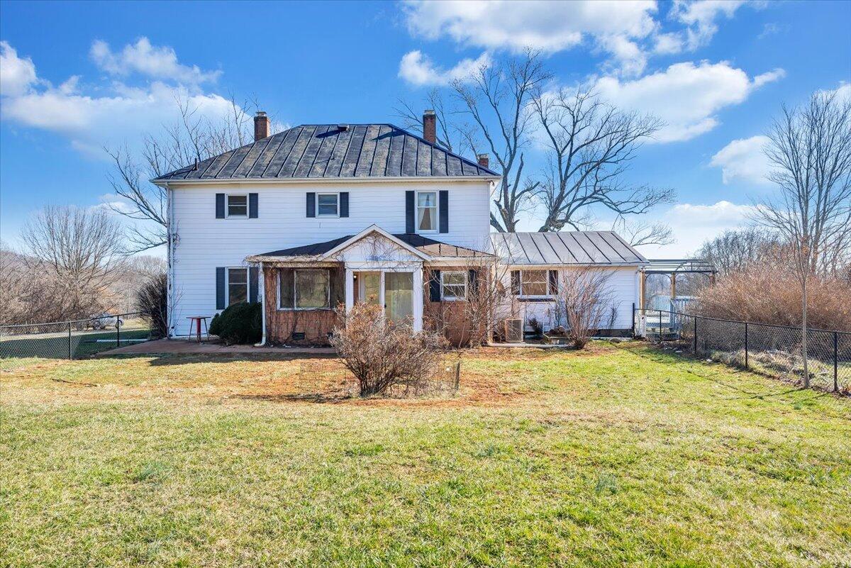 181 Chestnut Grove Road Callaway, VA 24067 - Photo 8 of 51 a front view of a house with a yard