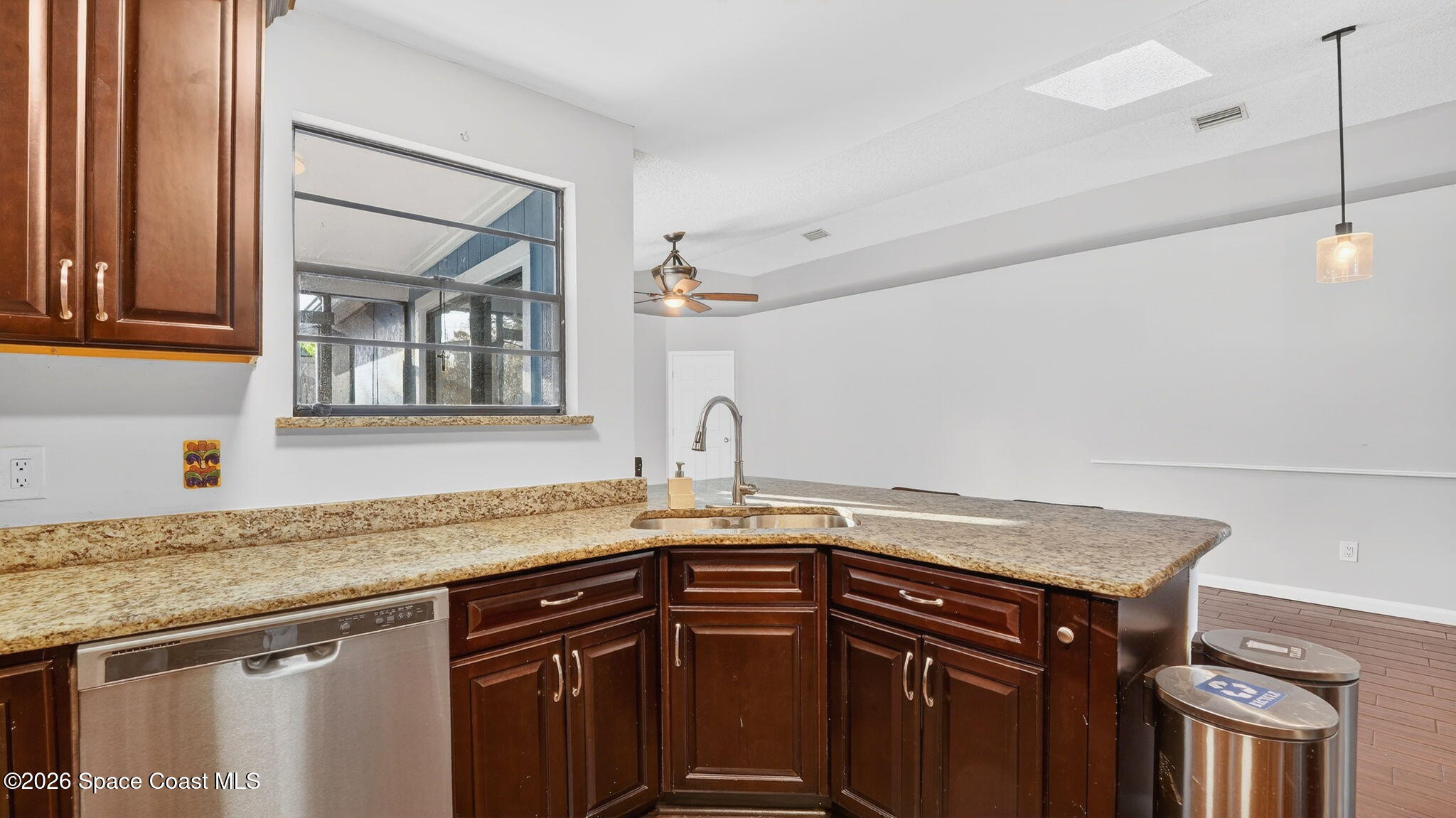 6398 Cable Avenue Cocoa, FL 32927 - Photo 12 of 30 a kitchen with a sink and cabinets