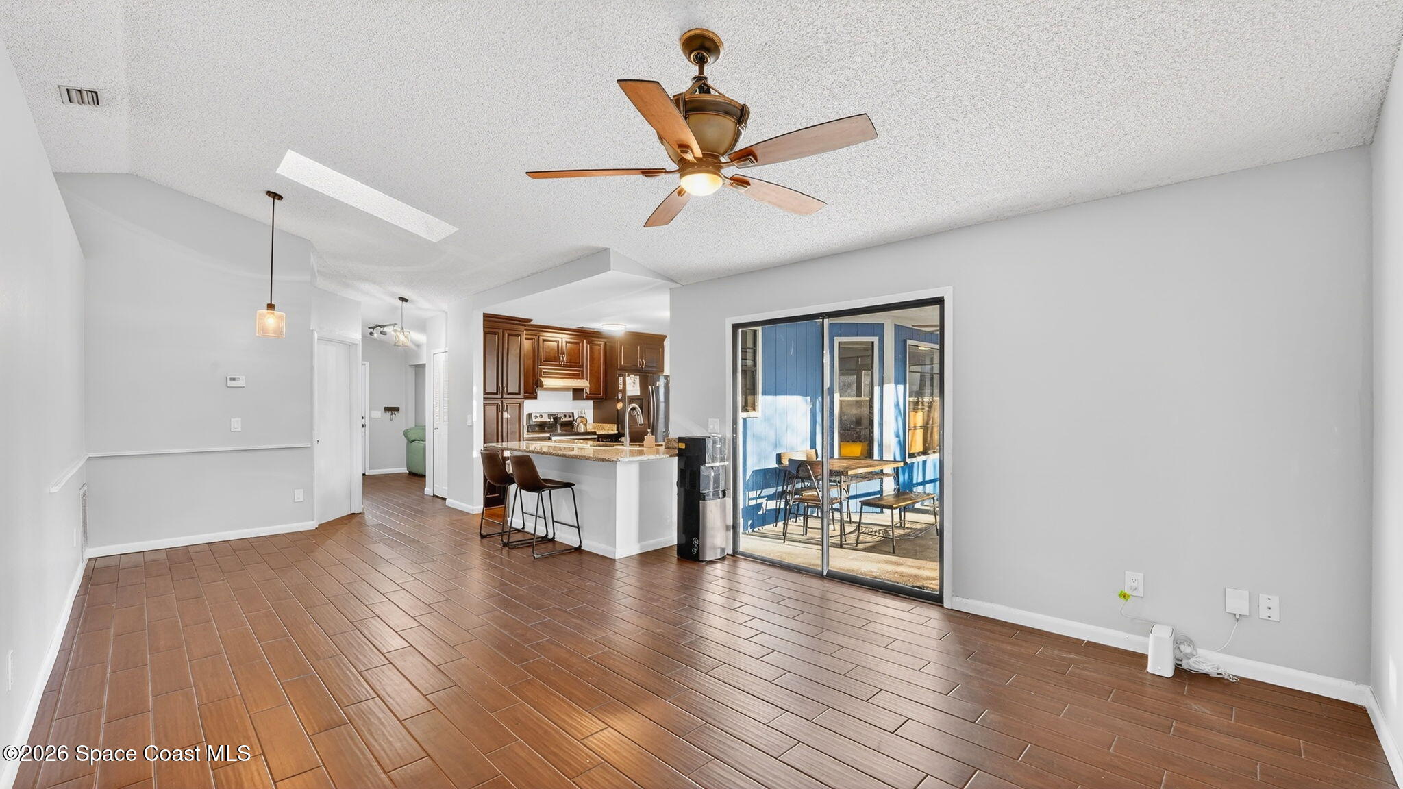 6398 Cable Avenue Cocoa, FL 32927 - Photo 15 of 30 a view of a livingroom with furniture and a ceiling fan
