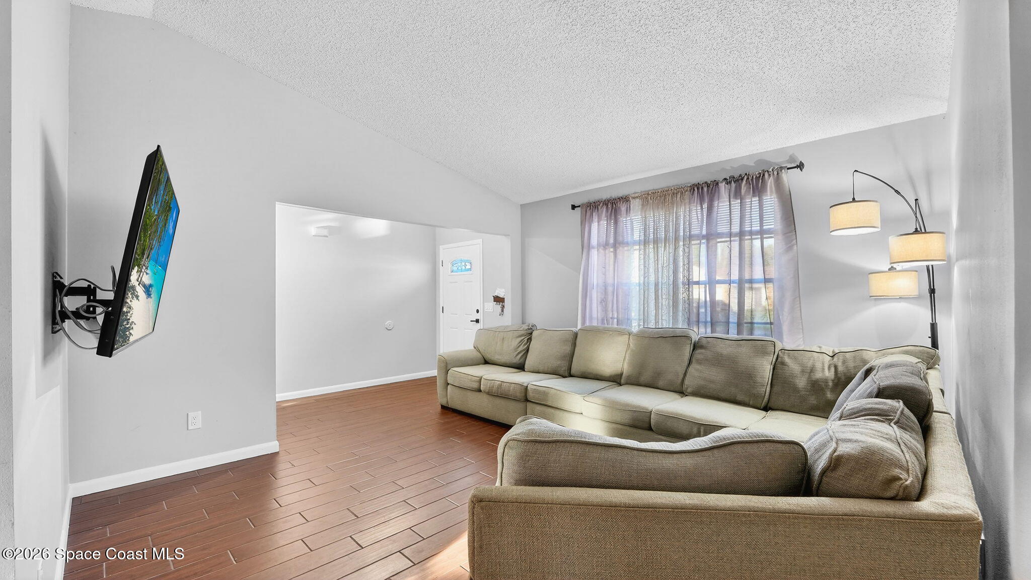 6398 Cable Avenue Cocoa, FL 32927 - Photo 7 of 30 a living room with furniture and a window