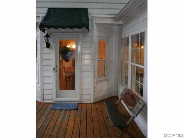 12800 Rivers Bend Road Chester, VA 23836 - Photo 8 of 10 a view of a hallway and wooden floor