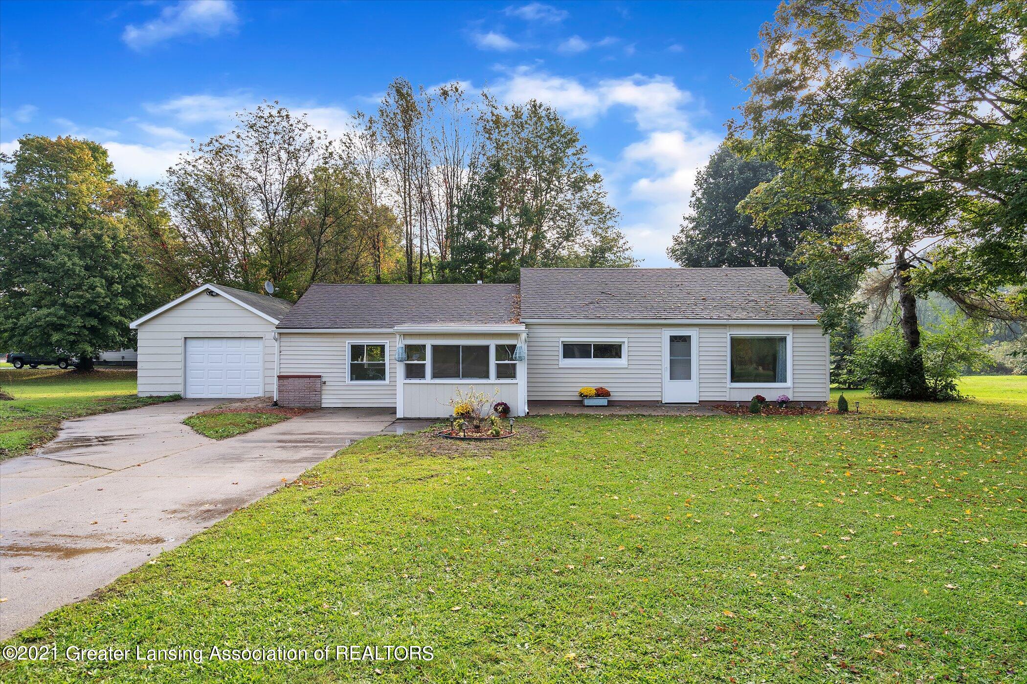03-2925 S Canfield Rd-Windowstill Real E