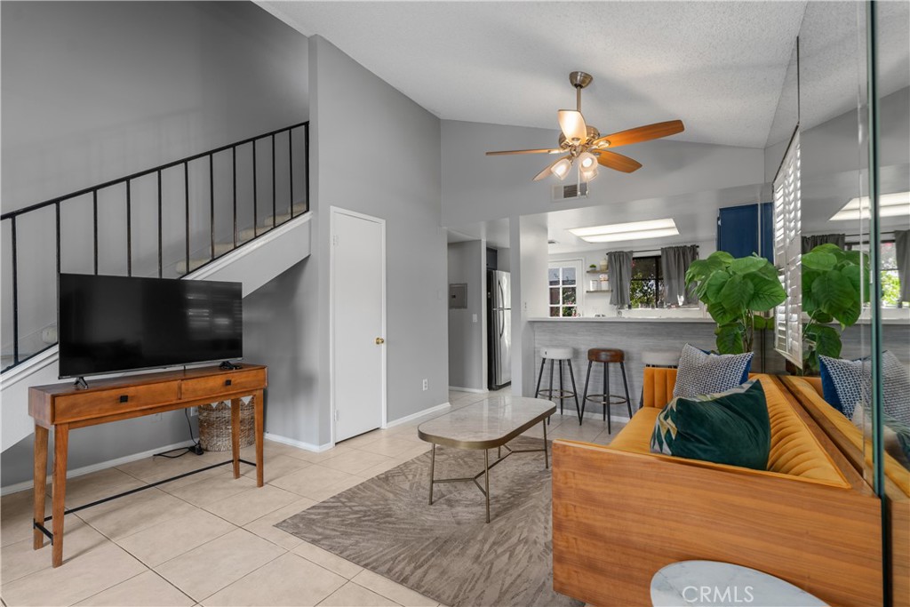 69646 Antonia Way Rancho Mirage, CA 92270 - Photo 18 of 50 a living room with furniture and a flat screen tv