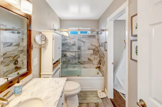 a view of a backyard with sitting area