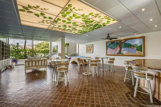 a lobby with furniture and a large window