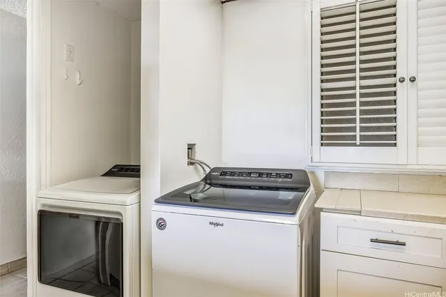 a kitchen with a stove and a microwave