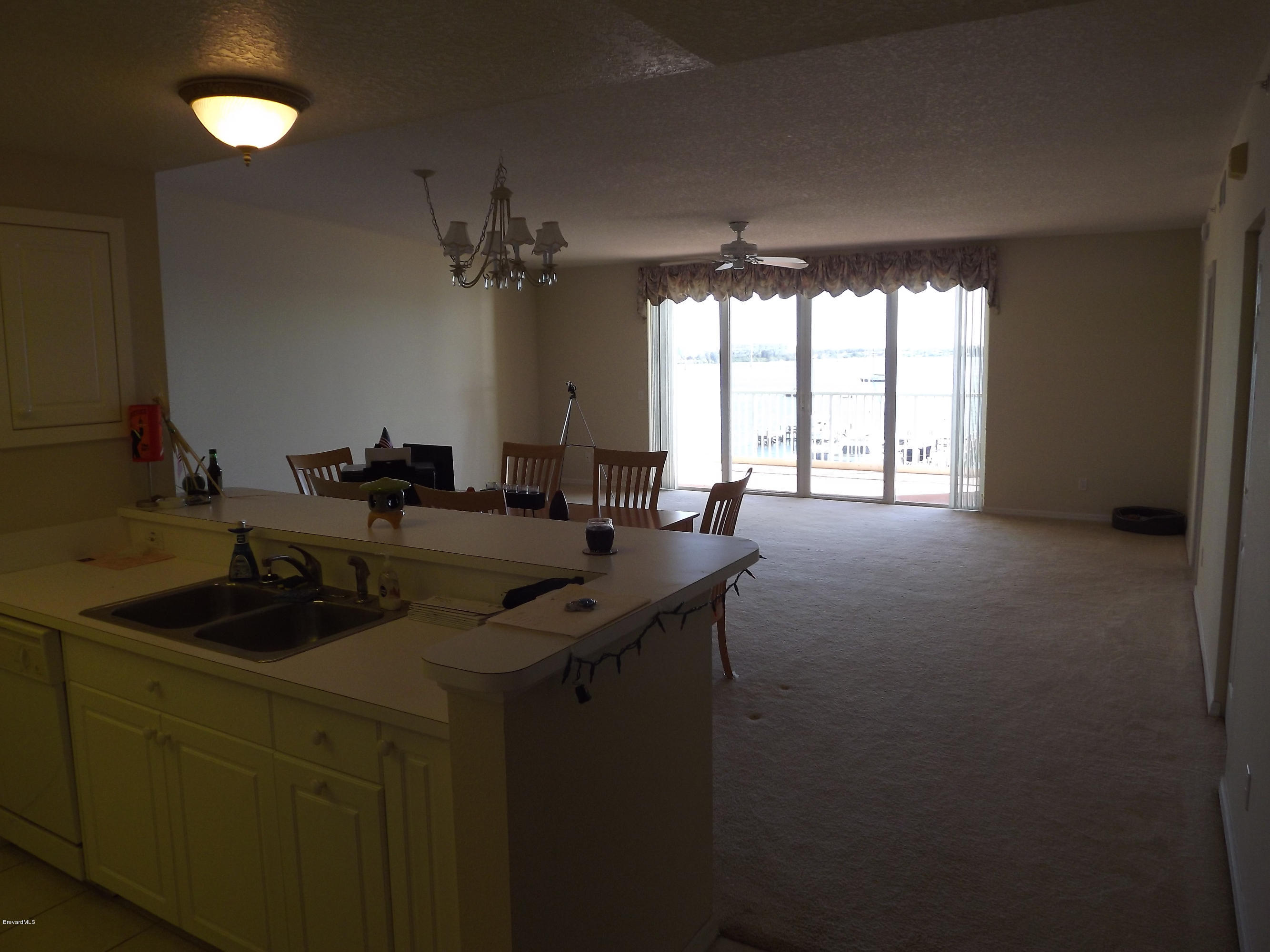 102 Riverside Drive, Unit 404 Cocoa, FL 32922 - Photo 11 of 29 Kitchen to Living Area