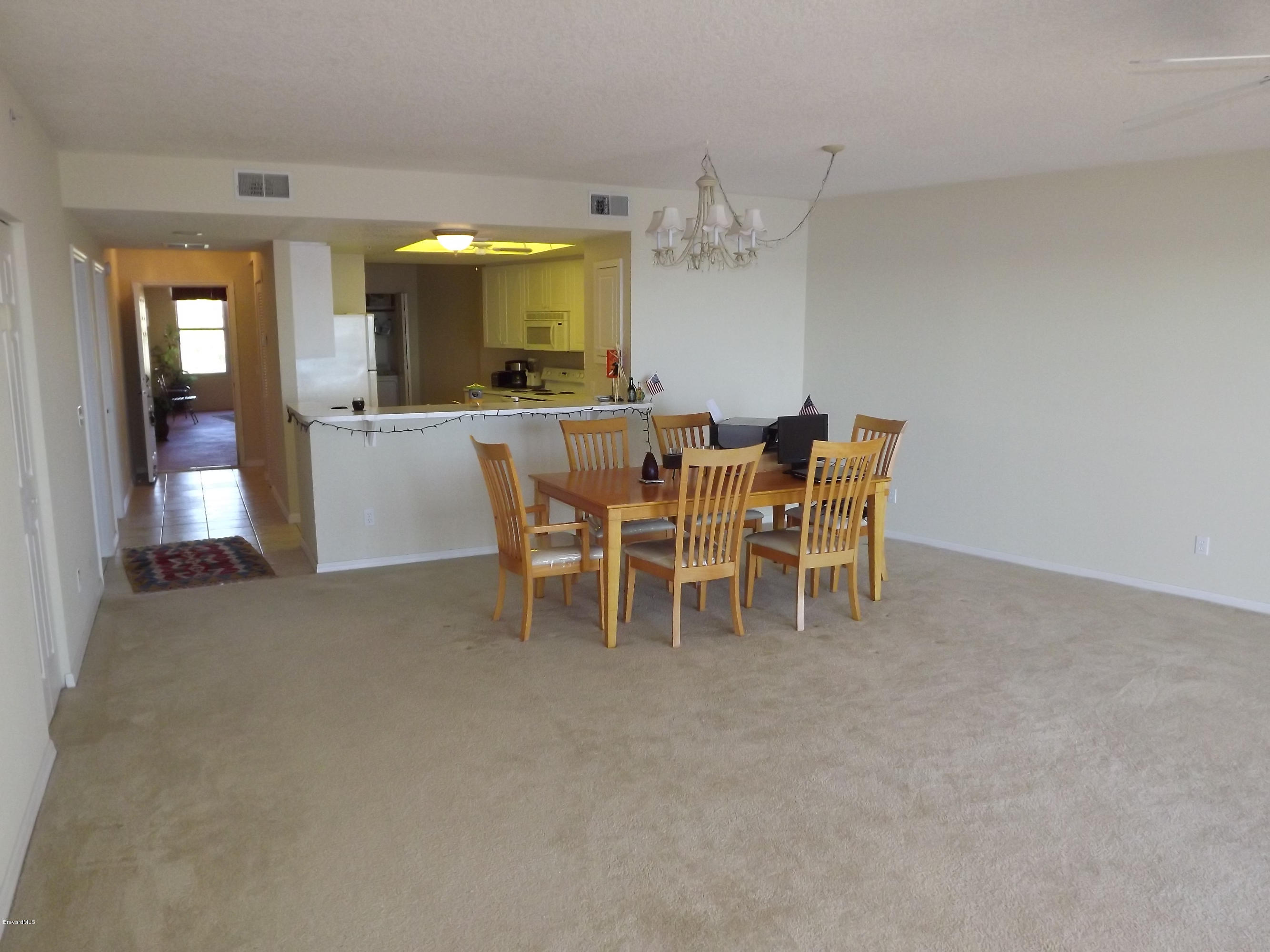 102 Riverside Drive, Unit 404 Cocoa, FL 32922 - Photo 16 of 29 Spacious Living Area