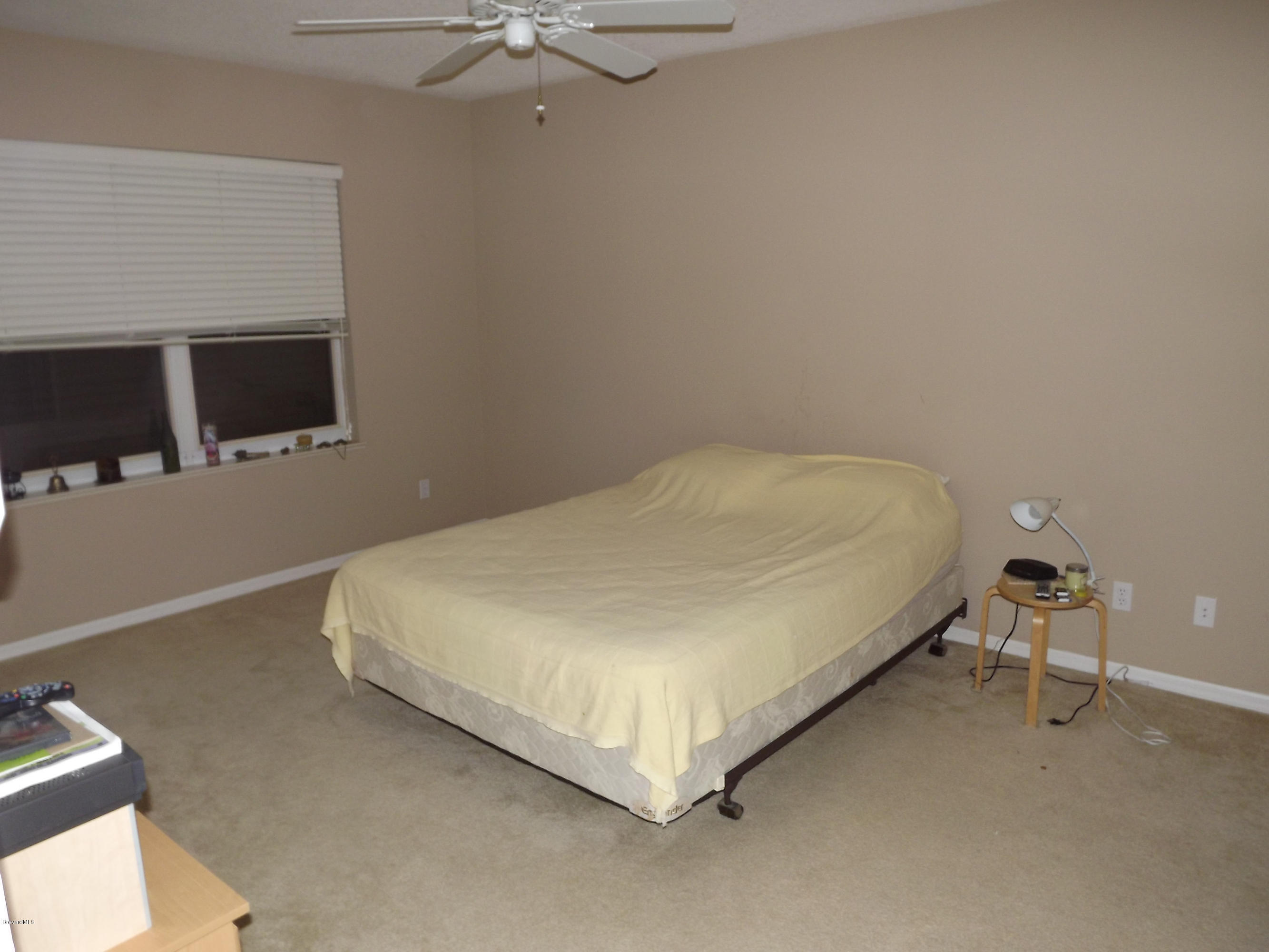102 Riverside Drive, Unit 404 Cocoa, FL 32922 - Photo 17 of 29 Master Bedroom