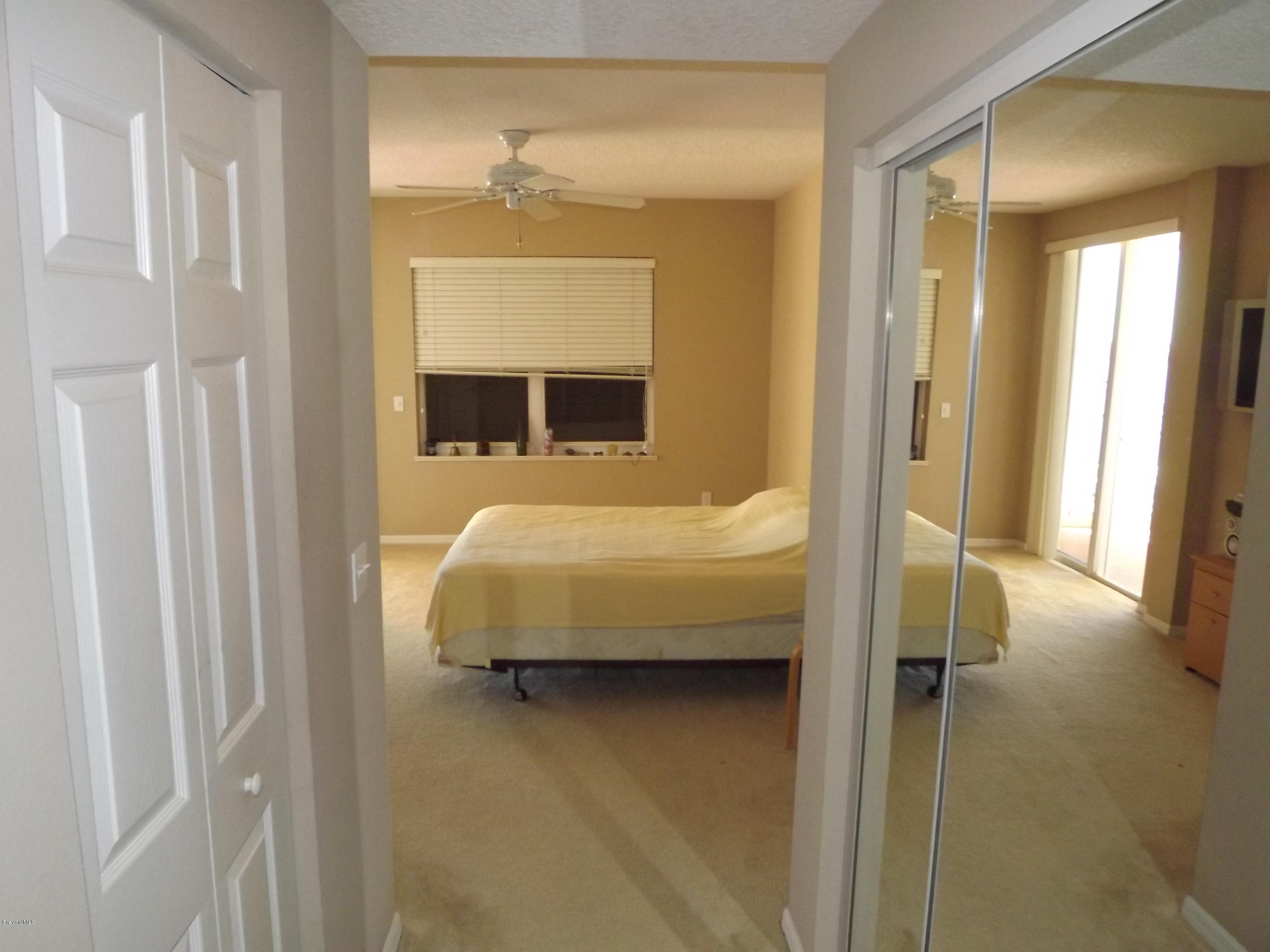 102 Riverside Drive, Unit 404 Cocoa, FL 32922 - Photo 22 of 29 Master Bedroom