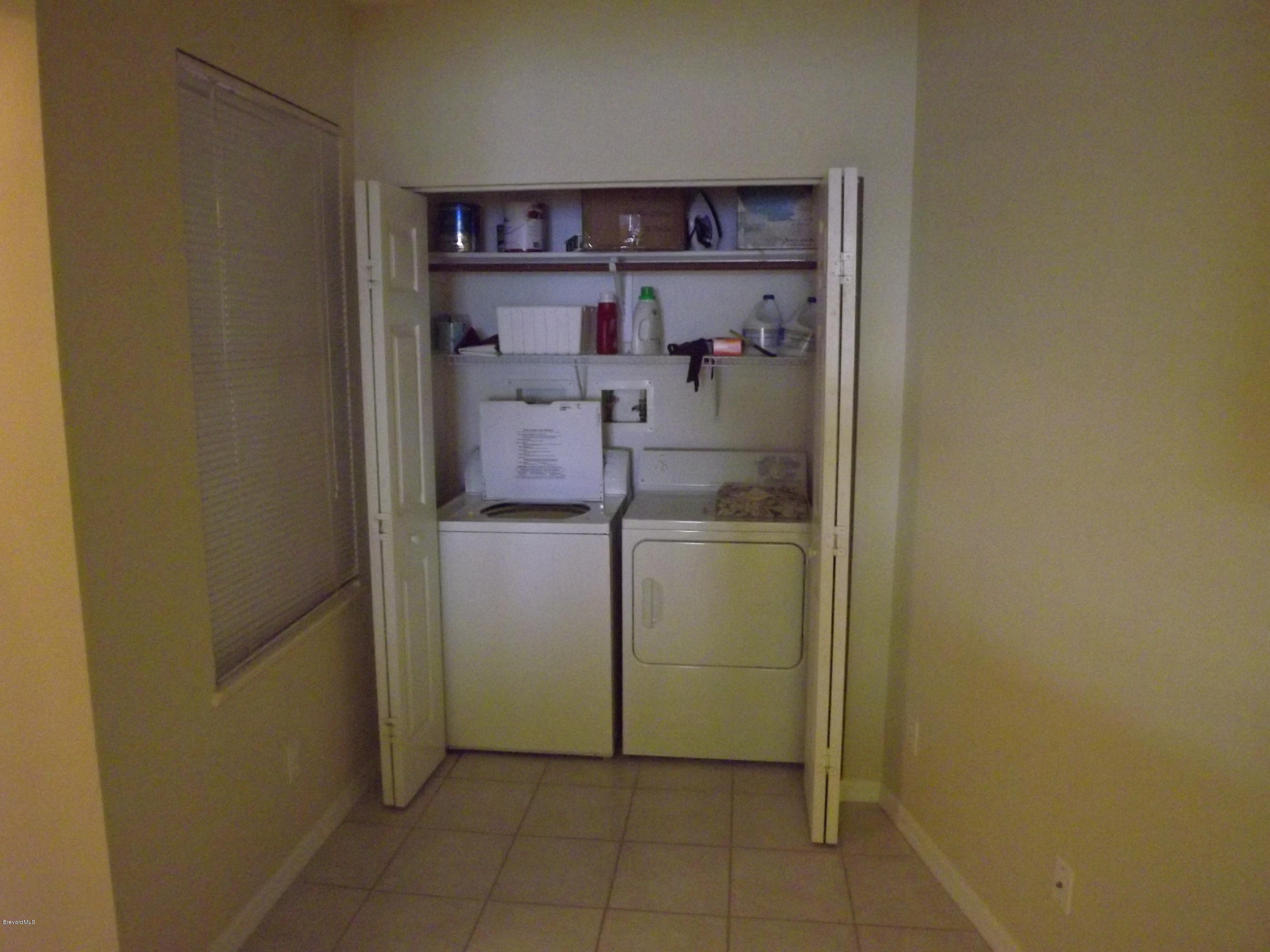 102 Riverside Drive, Unit 404 Cocoa, FL 32922 - Photo 8 of 29 Laundry Closet
