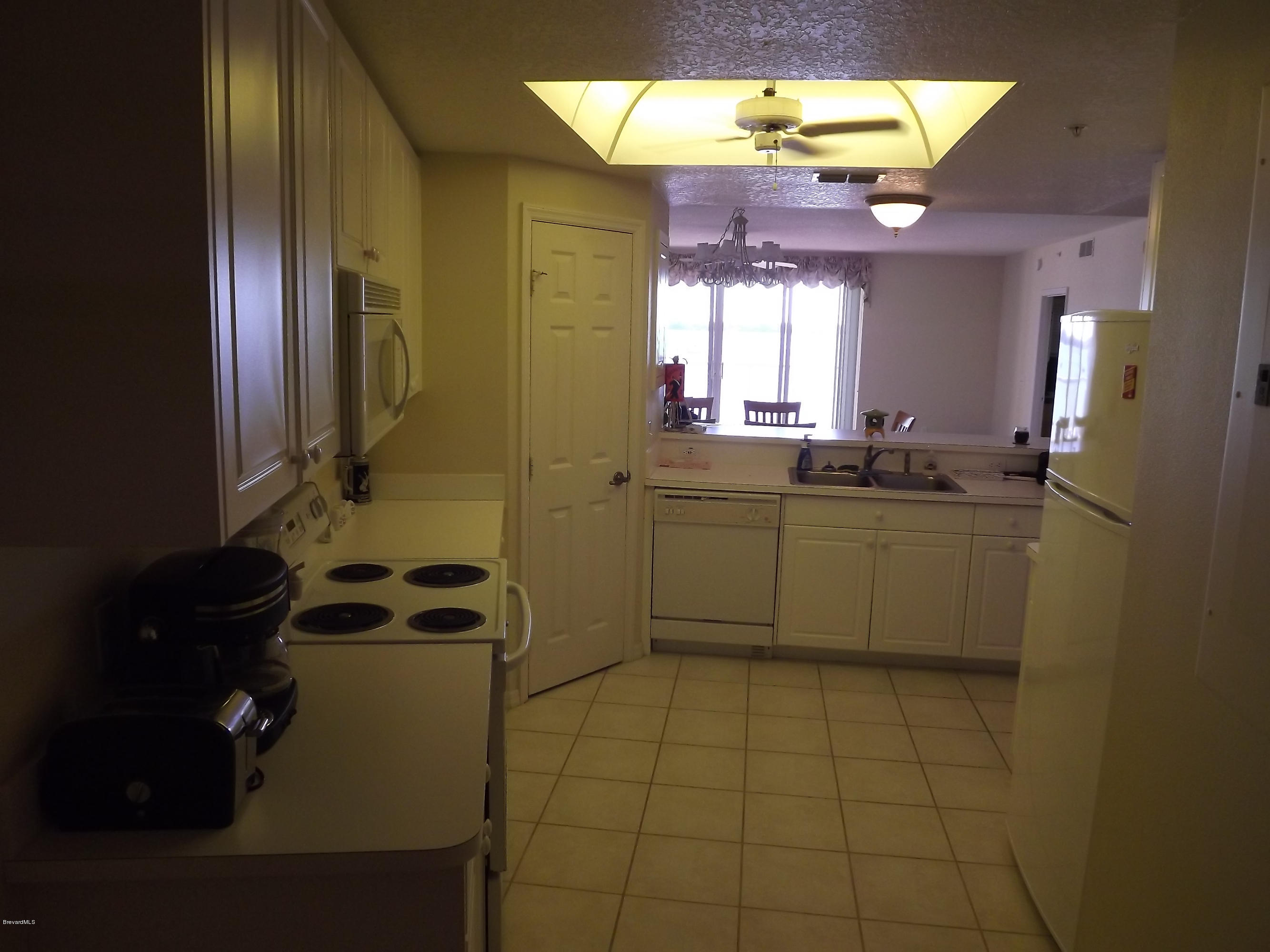 102 Riverside Drive, Unit 404 Cocoa, FL 32922 - Photo 9 of 29 Kitchen