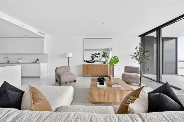 a living room with furniture and a couch