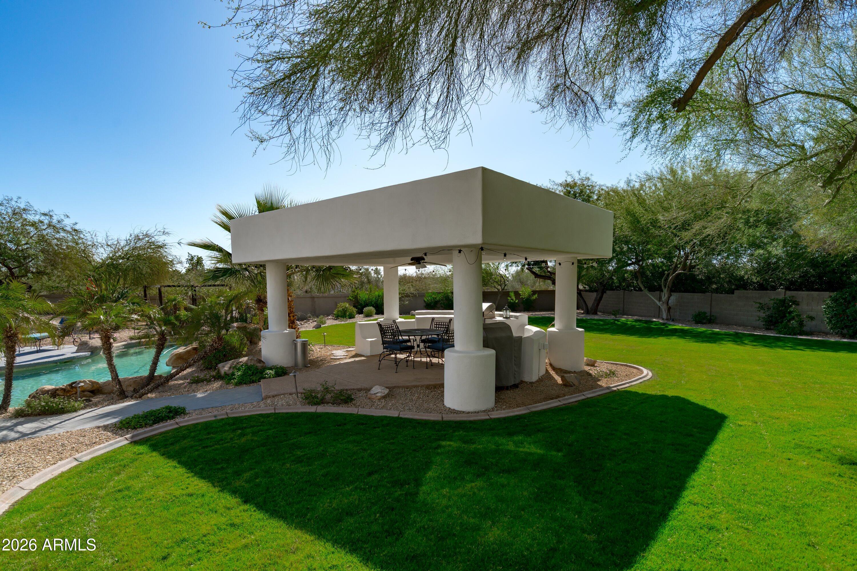 10800 East Cactus Road, Unit 7 Scottsdale, AZ 85259 - Photo 104 of 118 105-Covered Patio BBQ
