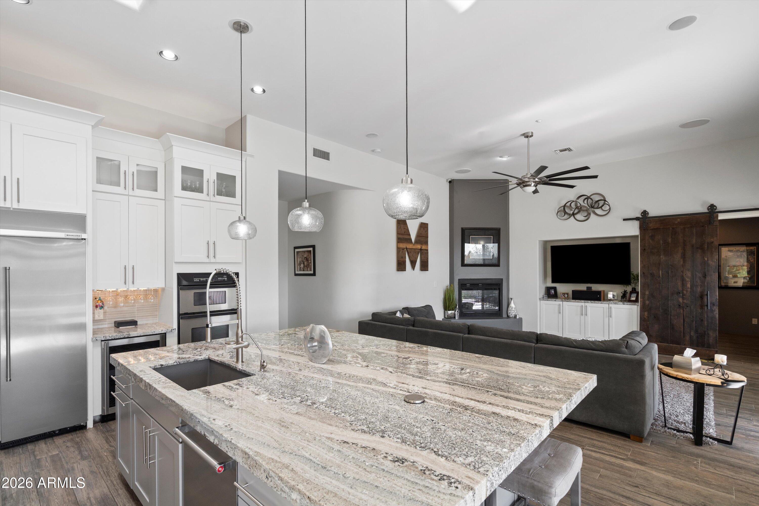 10800 East Cactus Road, Unit 7 Scottsdale, AZ 85259 - Photo 32 of 118 032-Kitchen to Family