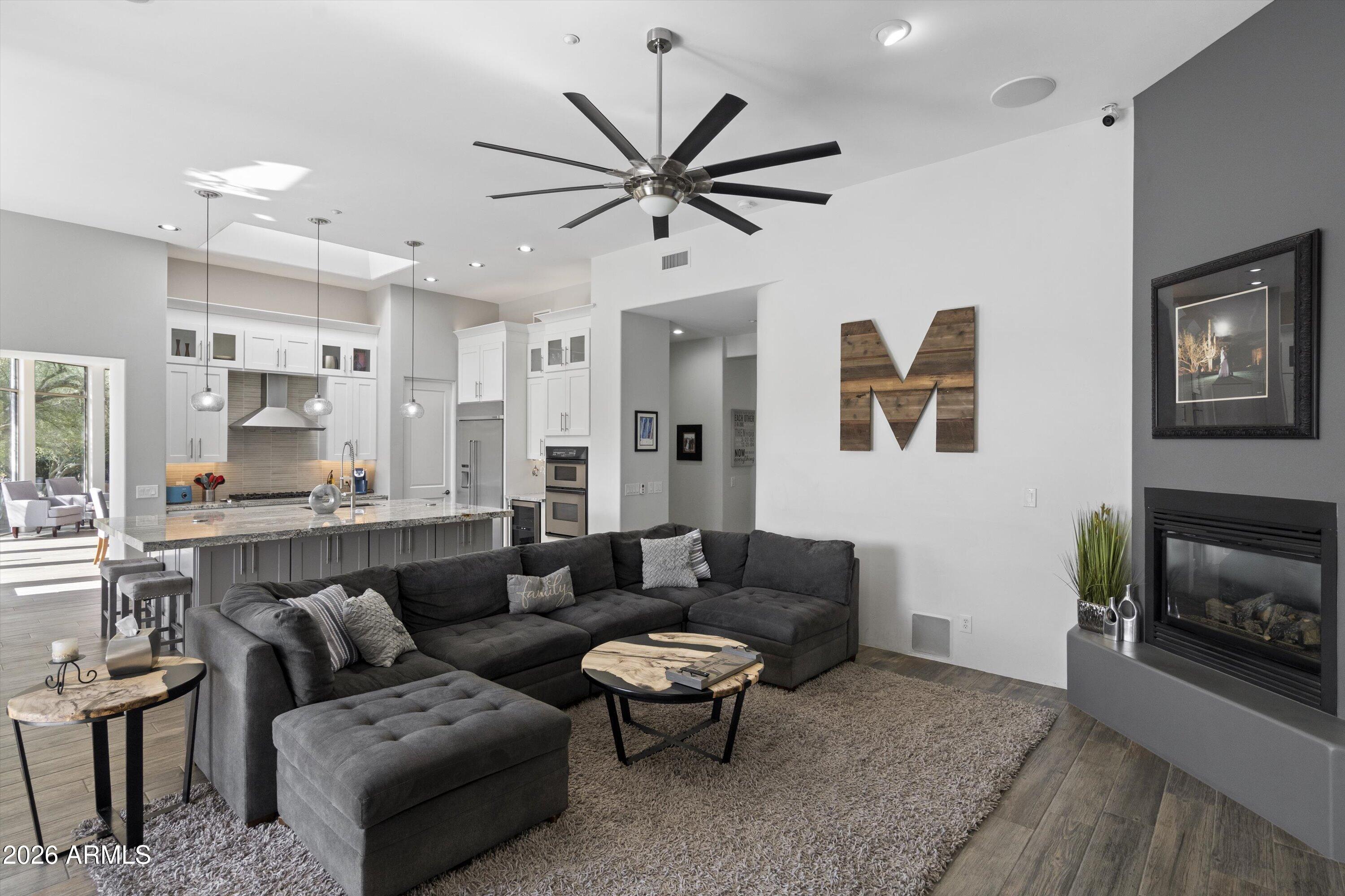 10800 East Cactus Road, Unit 7 Scottsdale, AZ 85259 - Photo 38 of 118 038-Family Room to Kitchen