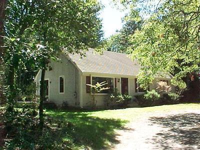25 Waterfield Road Osterville, MA 02655 - Photo 1 of 1 a backyard of a house with oven and garden