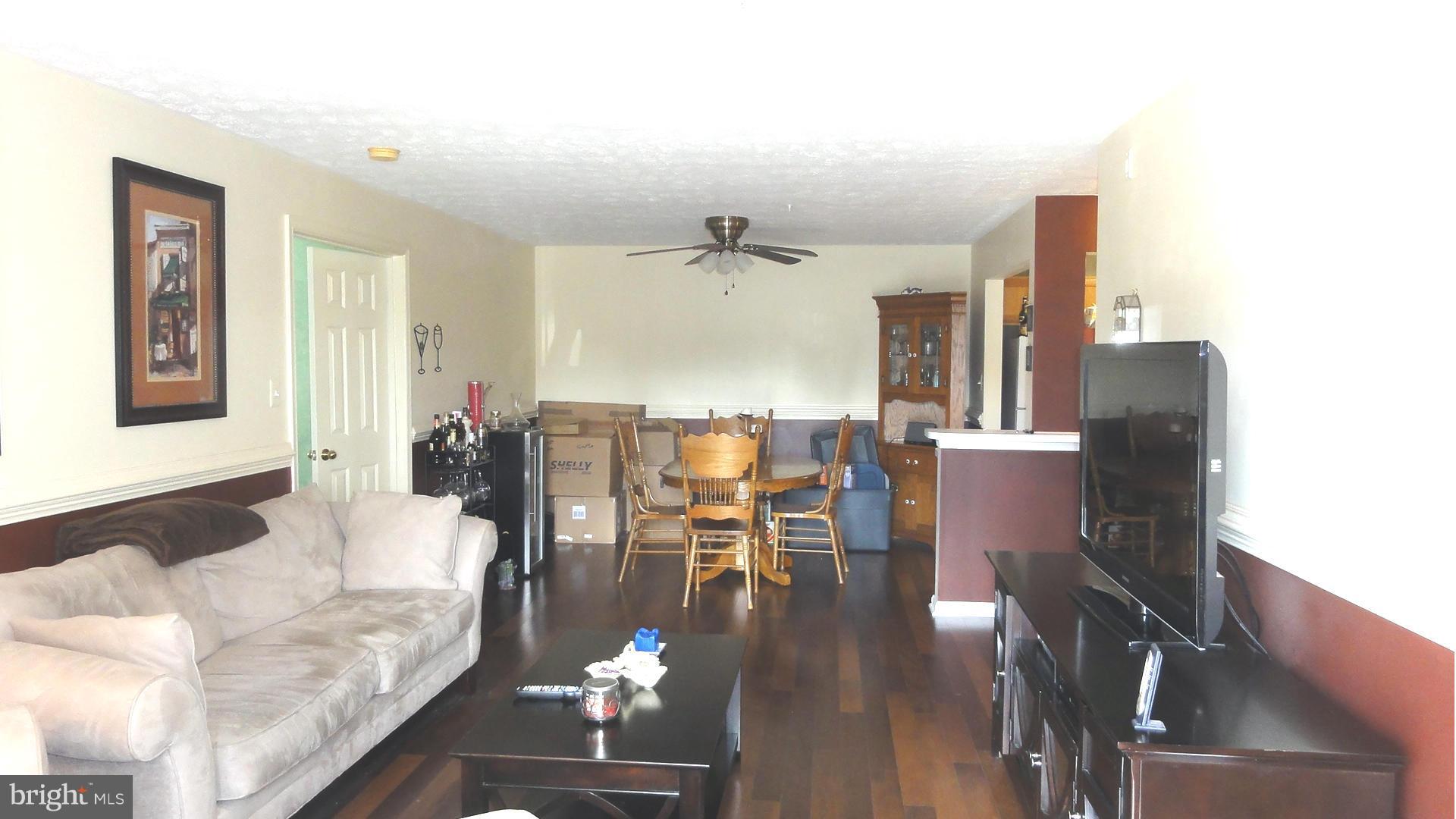 Reverse view with dining area in the background