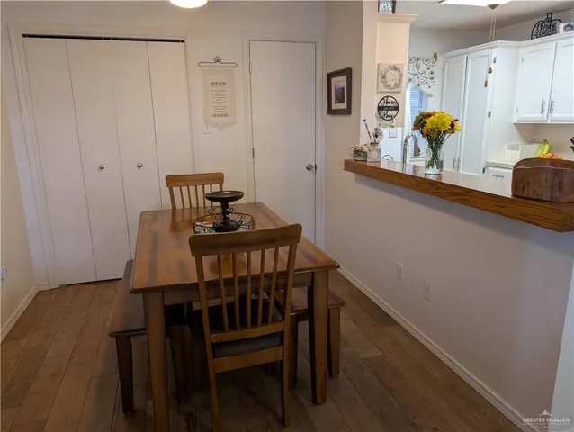 a view of a hallway with seating area
