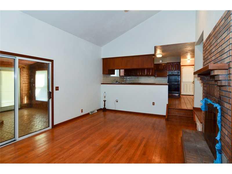 113 Fox Road Apollo, PA 15613 - Photo 2 of 15 Living Room. Sunken Living Room great hardwood floors, fireplace, built in bookcase