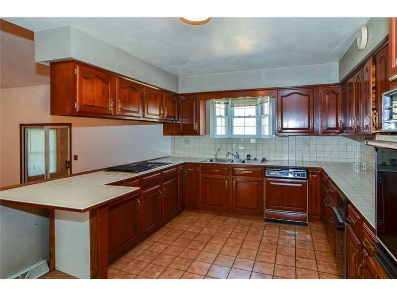 113 Fox Road Apollo, PA 15613 - Photo 4 of 15 Kitchen. Beautiful Cherry Cabinets, open floor plan to living room
