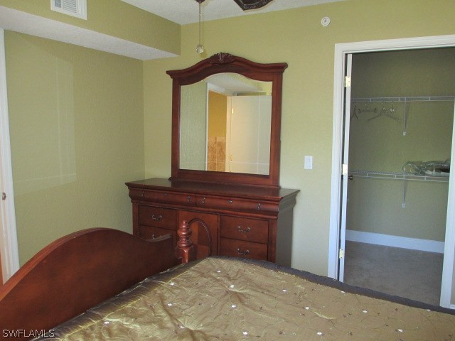 13581 Eagle Ridge Drive, Unit 1414 Fort Myers, FL 33912 - Photo 14 of 15 a room with a sink and a mirror