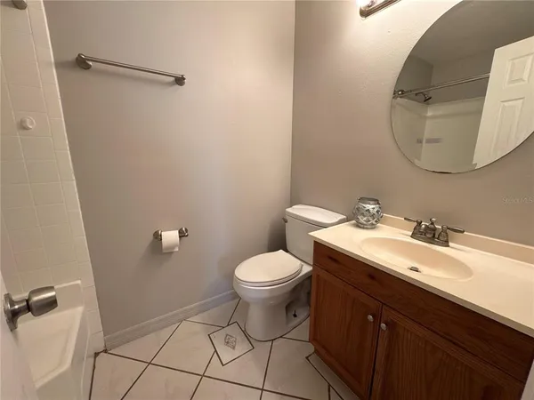a bathroom with a shower and a tub