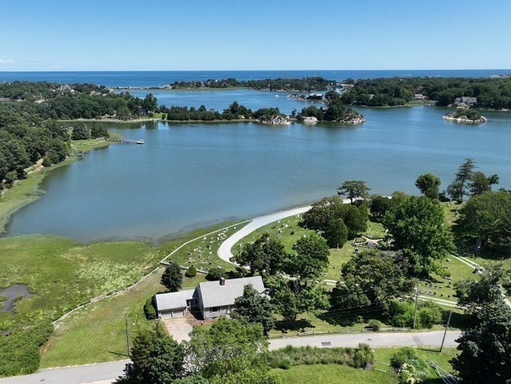 45 Joy Place Cohasset, MA 02025 - Photo 1 of 38 an aerial view of ocean residential house with outdoor space and trees