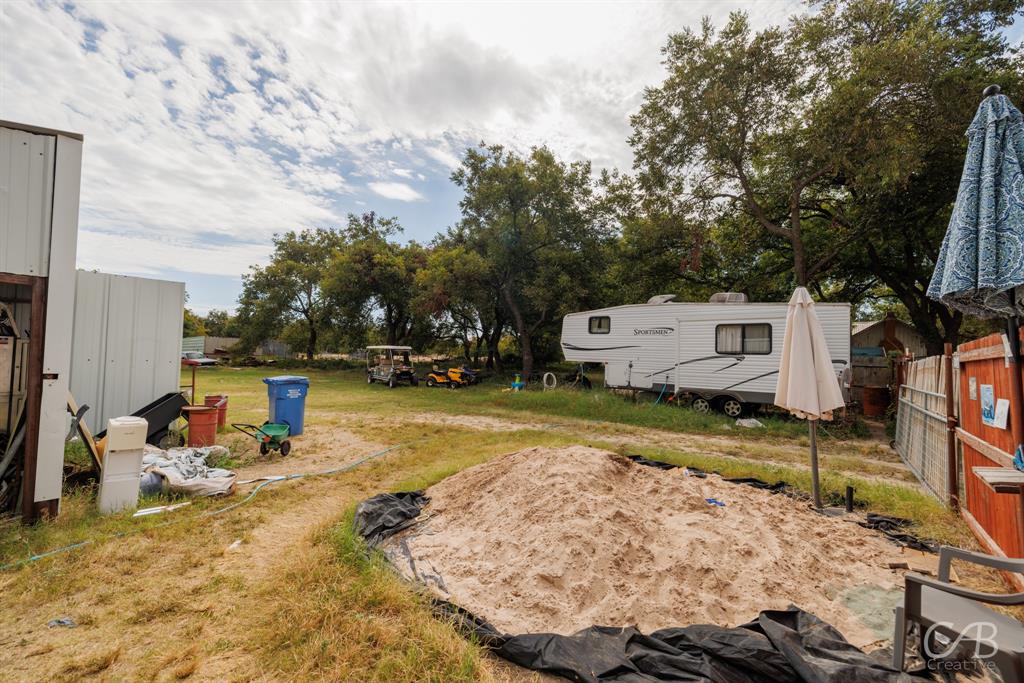 411 Hamby Road Clyde, TX 79510 - Photo 3 of 7 a view of a yard with cars