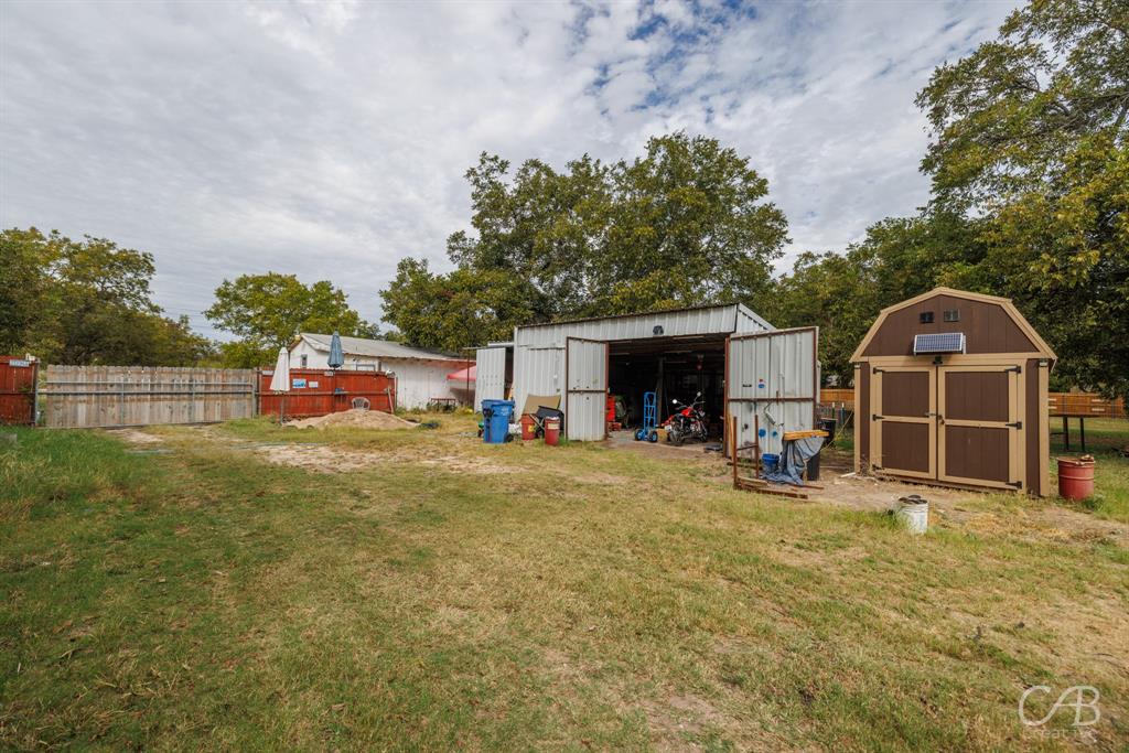 411 Hamby Road Clyde, TX 79510 - Photo 4 of 7 a view of a house with backyard and sitting area