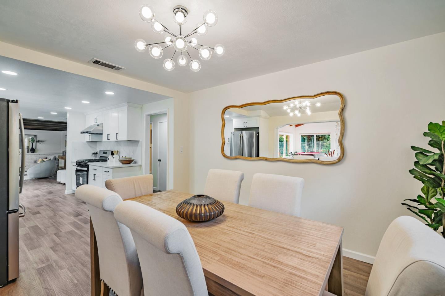 8085 Vía Zapata Dublin, CA 94568 - Photo 17 of 55 a living room with furniture and a chandelier