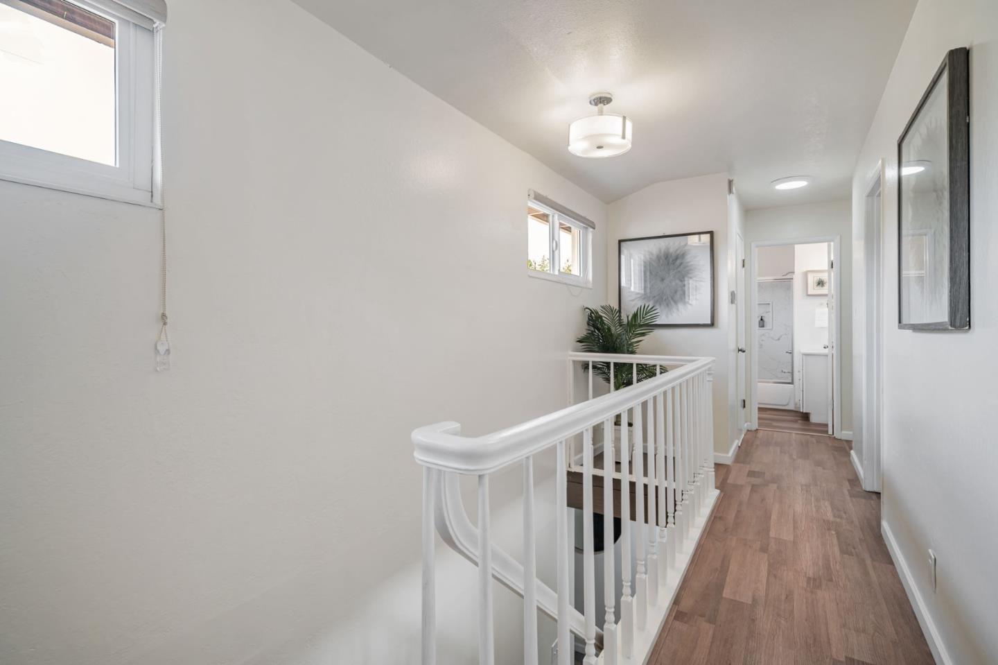 8085 Vía Zapata Dublin, CA 94568 - Photo 28 of 55 a view of a hallway with wooden floor and staircase
