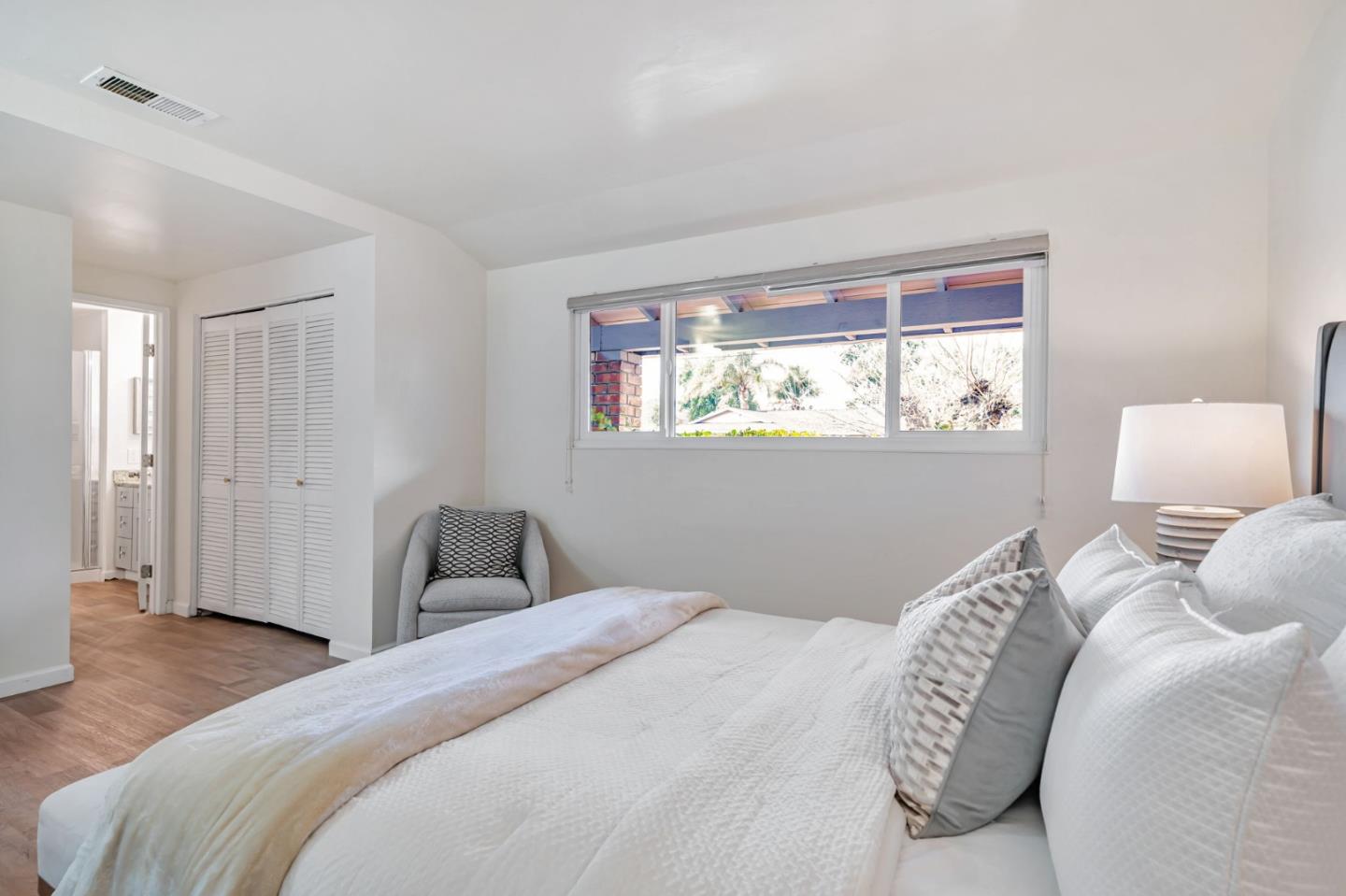 8085 Vía Zapata Dublin, CA 94568 - Photo 32 of 55 a bedroom with a bed and a window