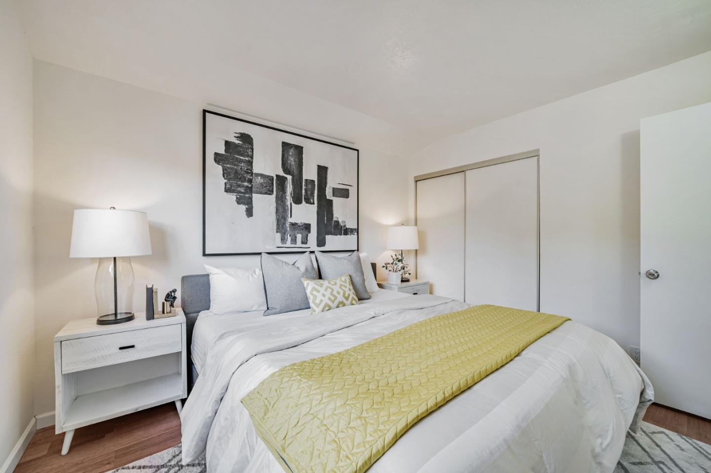 8085 Vía Zapata Dublin, CA 94568 - Photo 42 of 55 a bedroom with a large bed and a lamp on table