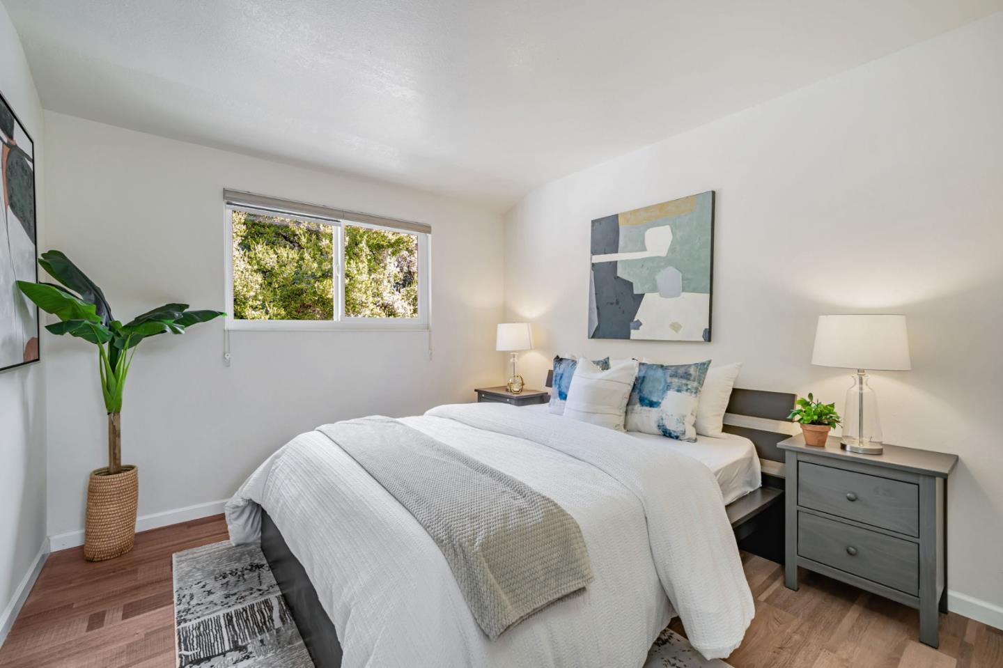 8085 Vía Zapata Dublin, CA 94568 - Photo 43 of 55 a bedroom with a bed and a potted plant