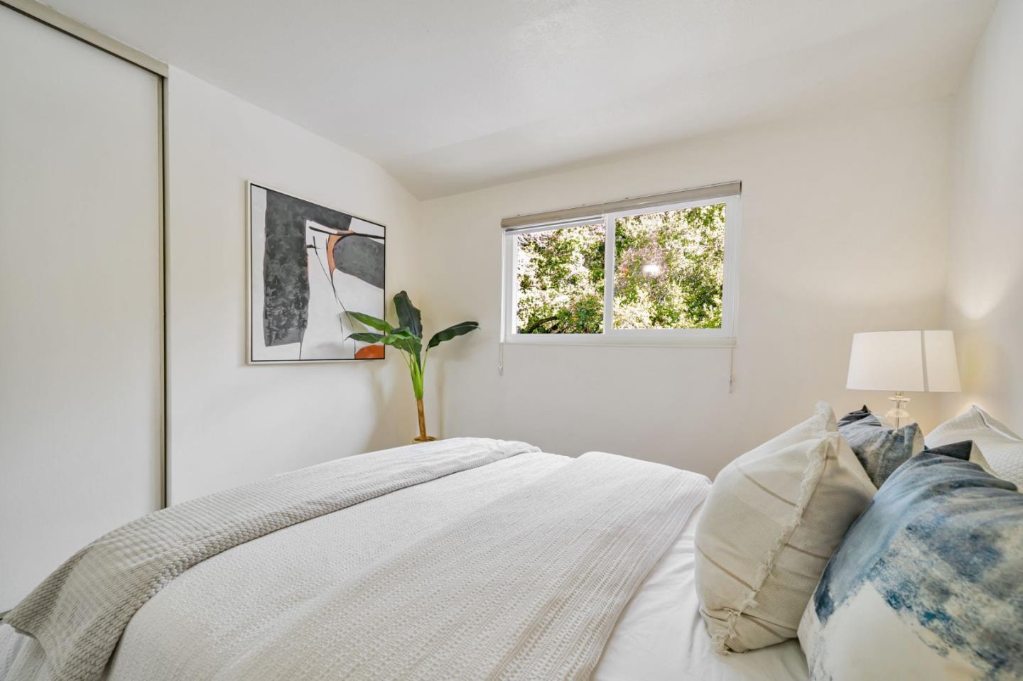 8085 Vía Zapata Dublin, CA 94568 - Photo 44 of 55 a bedroom with a bed and a window