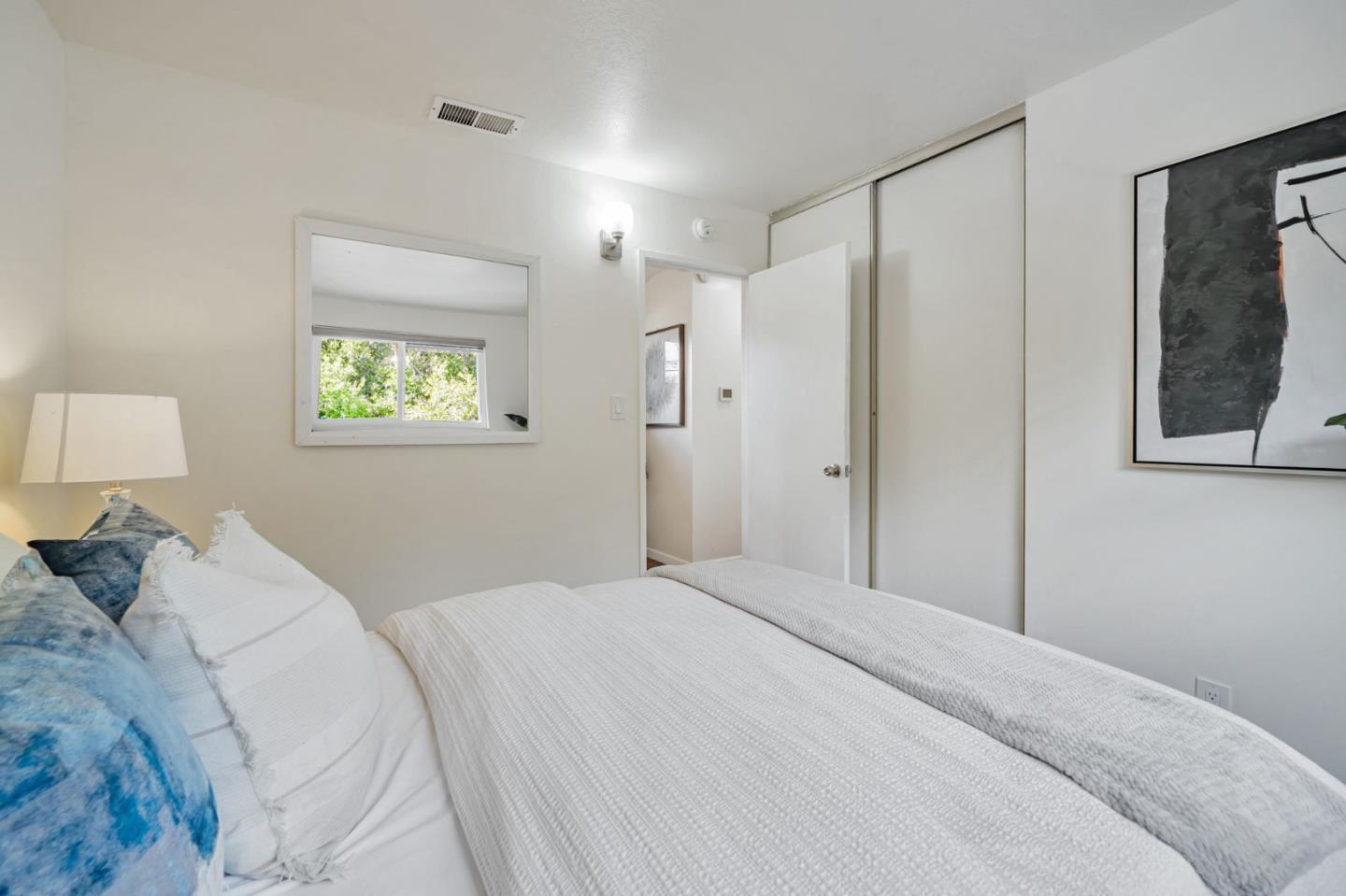 8085 Vía Zapata Dublin, CA 94568 - Photo 46 of 55 a bedroom with a large bed and a window