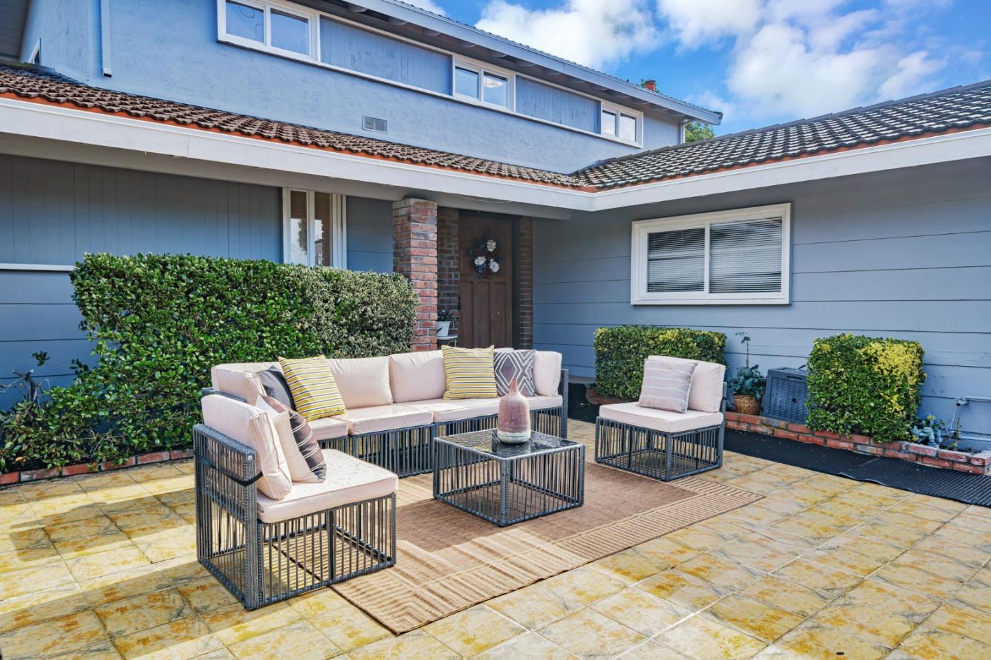8085 Vía Zapata Dublin, CA 94568 - Photo 5 of 55 a view of a patio with couches table and chairs and potted plants