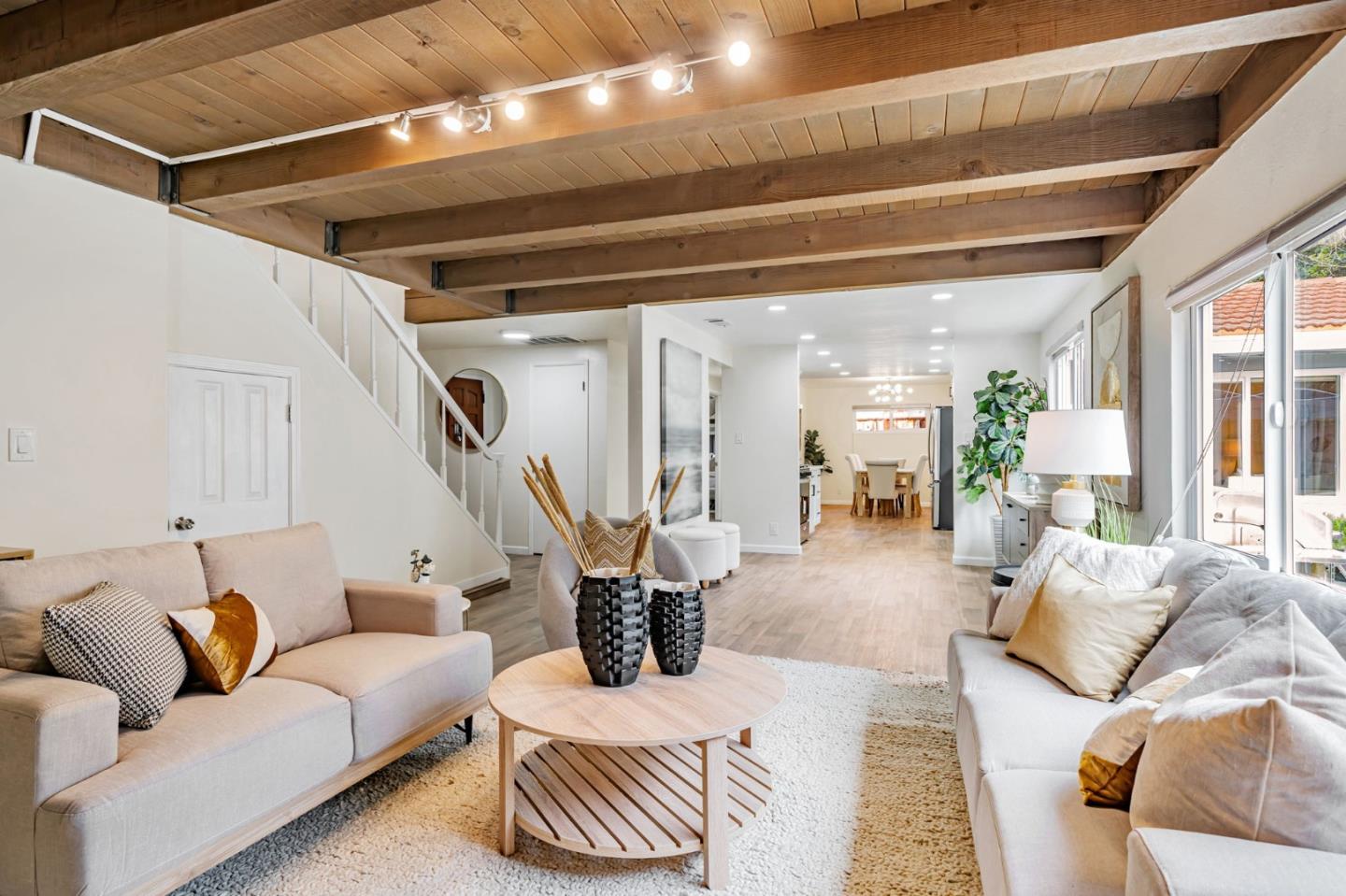 8085 Vía Zapata Dublin, CA 94568 - Photo 10 of 55 a living room with furniture and a chandelier