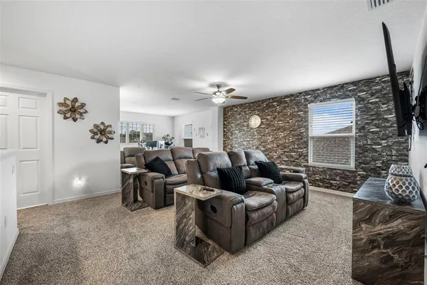 a view of a workspace with furniture