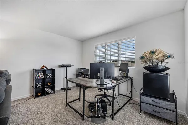 a bathroom with a shower and a sink