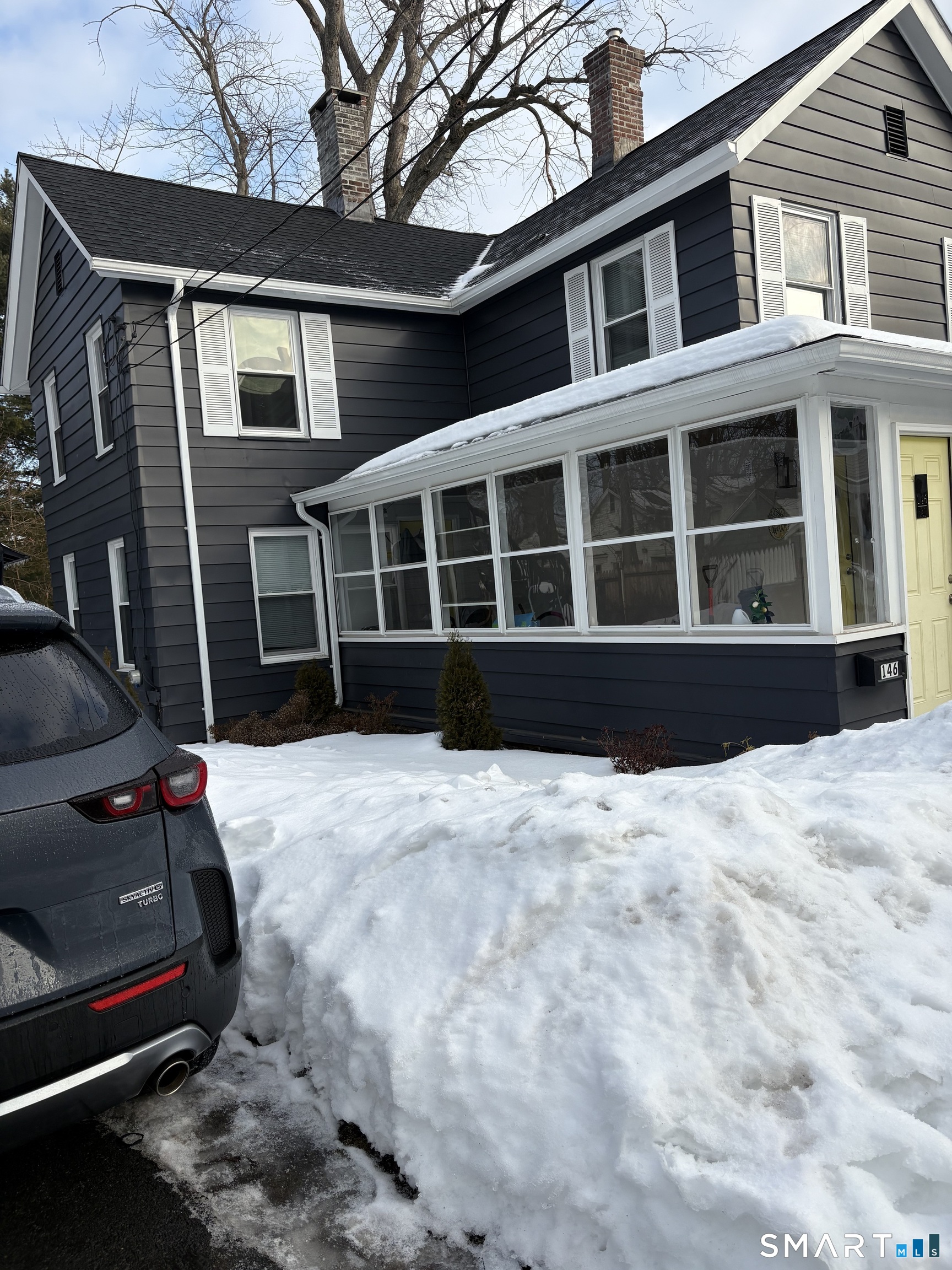 146 Liberty Street Middletown, CT 06457 - Photo 2 of 11 a view of a house with a large window