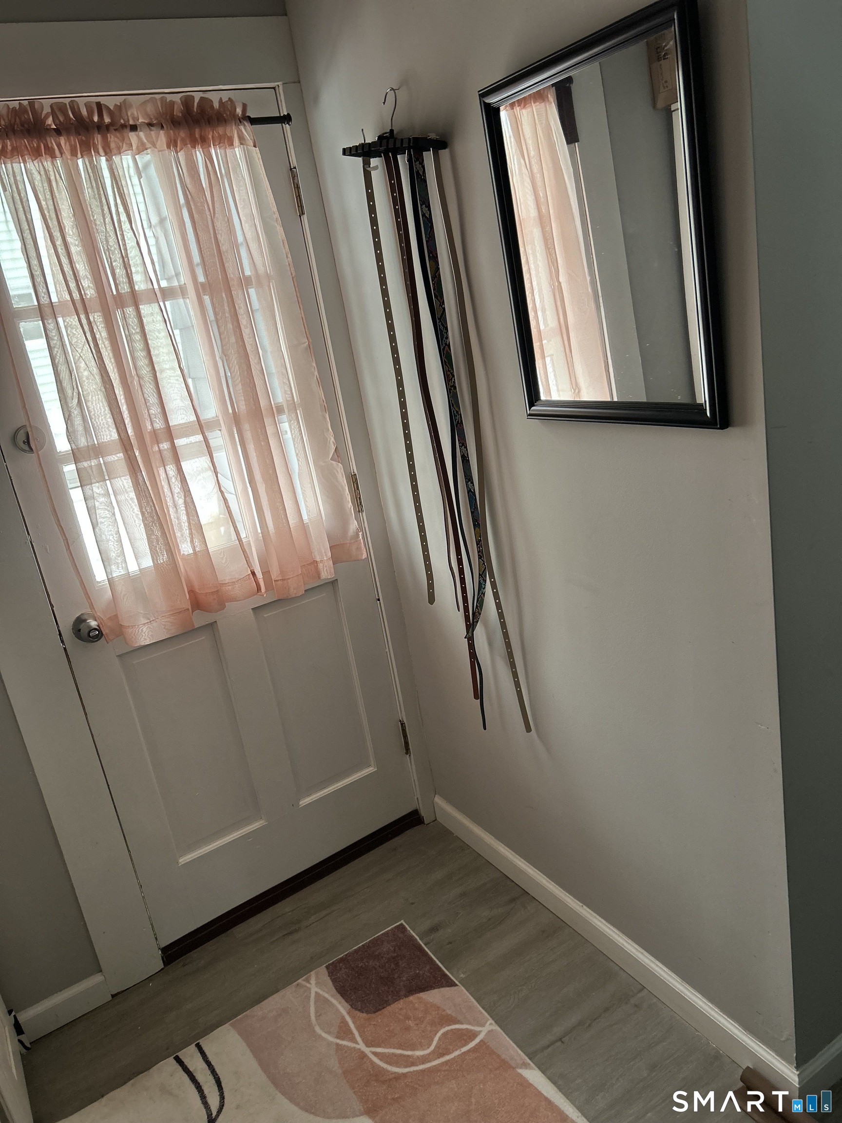 146 Liberty Street Middletown, CT 06457 - Photo 8 of 11 a view of an entryway with a window