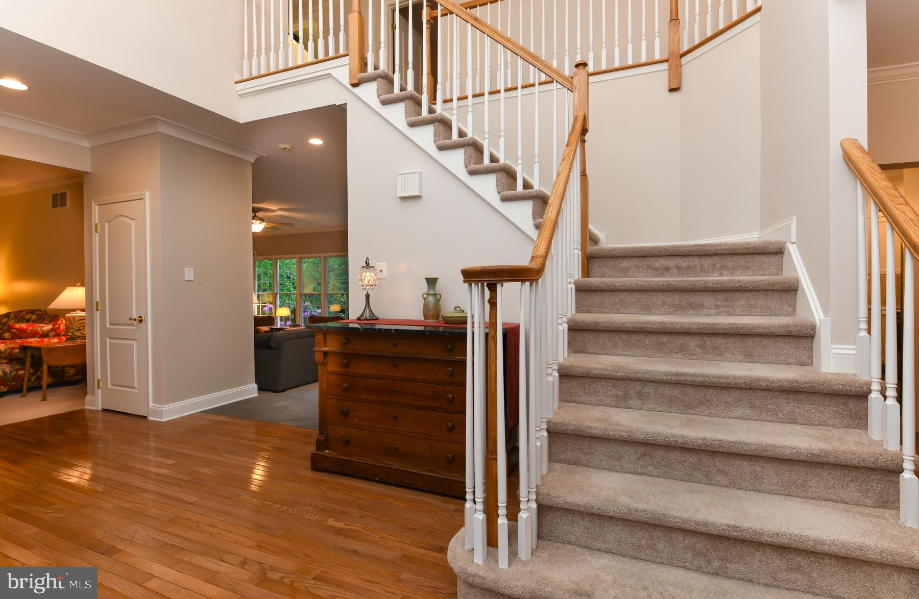 31 Millwood Drive Mickleton, NJ 08056 - Photo 12 of 62 a view of entryway and hall with wooden floor