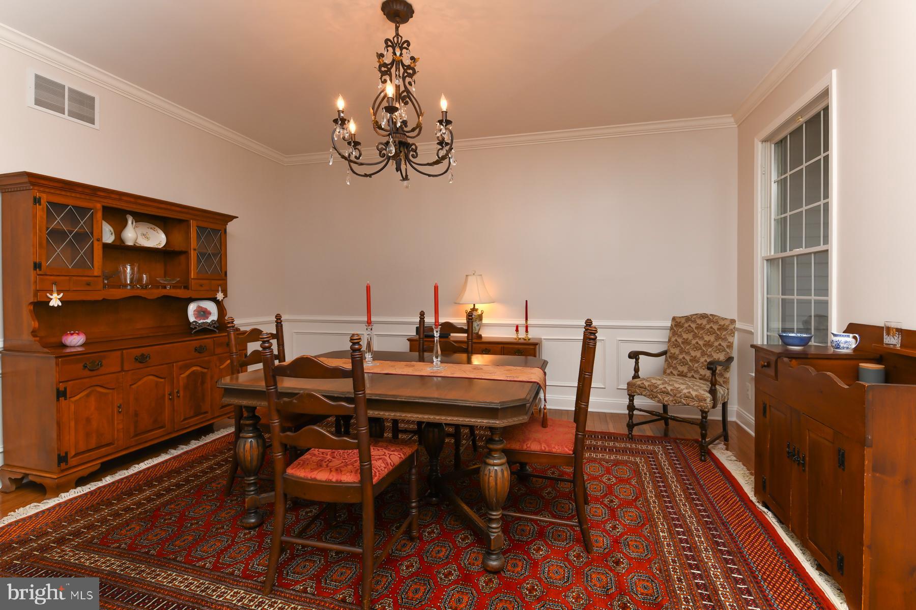 31 Millwood Drive Mickleton, NJ 08056 - Photo 16 of 62 a dining room with furniture a rug and wooden floor
