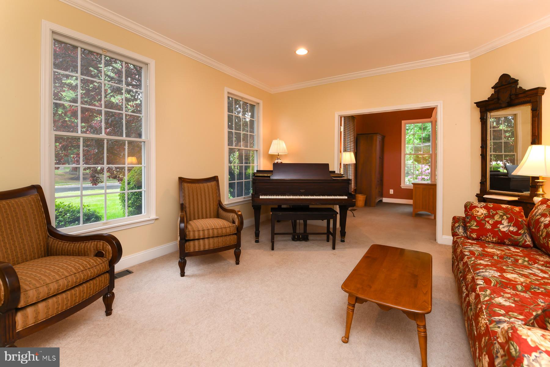 31 Millwood Drive Mickleton, NJ 08056 - Photo 17 of 62 a living room with furniture and a large window