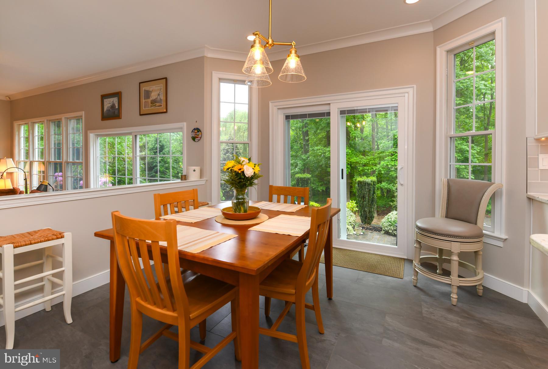 31 Millwood Drive Mickleton, NJ 08056 - Photo 22 of 62 a dining room with furniture a chandelier and wooden floor