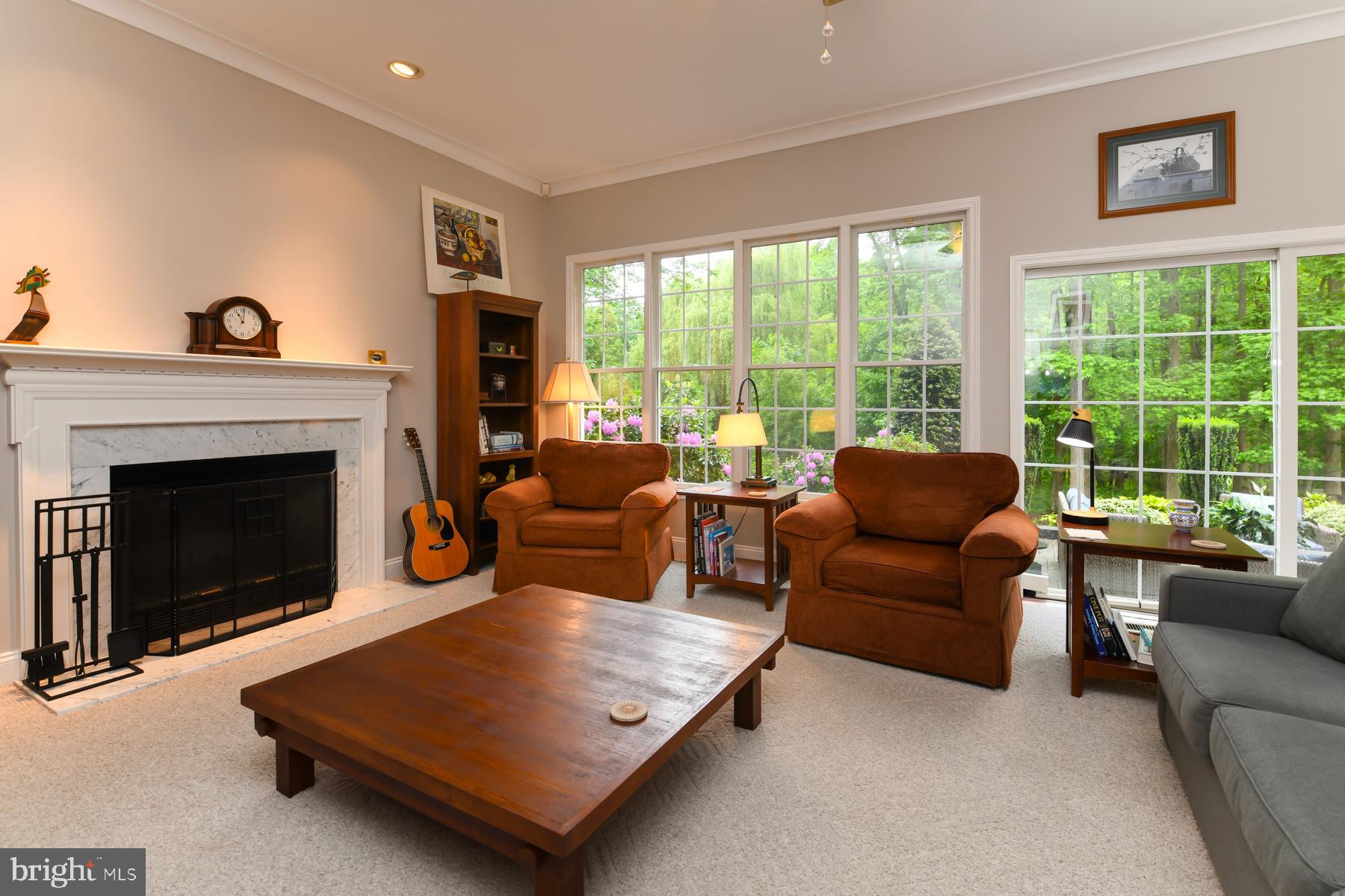 31 Millwood Drive Mickleton, NJ 08056 - Photo 29 of 62 a living room with furniture and a fireplace